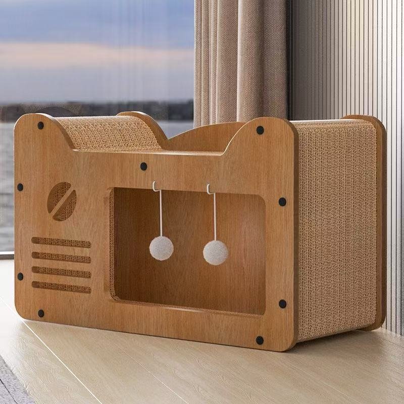 Wooden cat house scratcher with corrugated cardboard sides and two hanging toy balls
